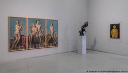 The painting 'Four Elements' by Nazi Adolf Ziegler hangs in the Pinakothek (left)