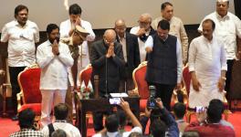 Maharashtra Governor Ramesh Bais with Chief Minister Eknath Shinde, Deputy Chief Ministers Devendra Fadnavis and Ajit Pawar, and newly sworn-in State Cabinet ministers during a ceremony at Raj Bhavan, in Mumbai, Sunday, July 2, 2023. 