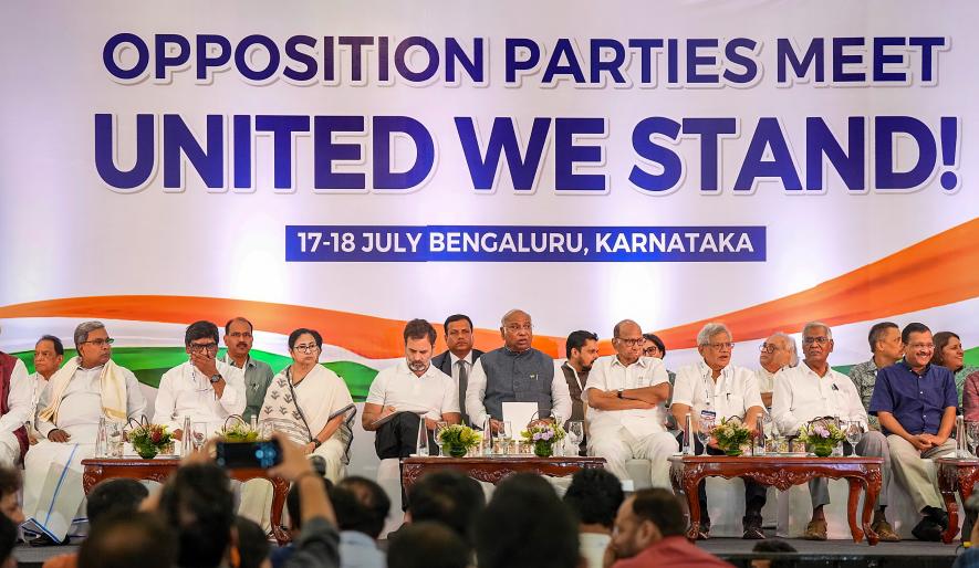 Congress President Mallikarjun Kharge, party leader Rahul Gandhi, West Bengal CM Mamata Banerjee, Delhi CM Arvind Kejriwal, NCP supremo Sharad Pawar and others at a press conference after the opposition parties' meeting, in Bengaluru, Tuesday, July 18, 2023.