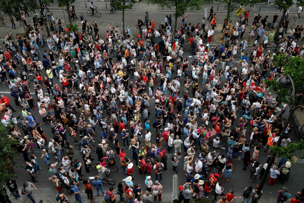 Tens Of Thousands Protest In France Against Macron’s Reforms | NewsClick