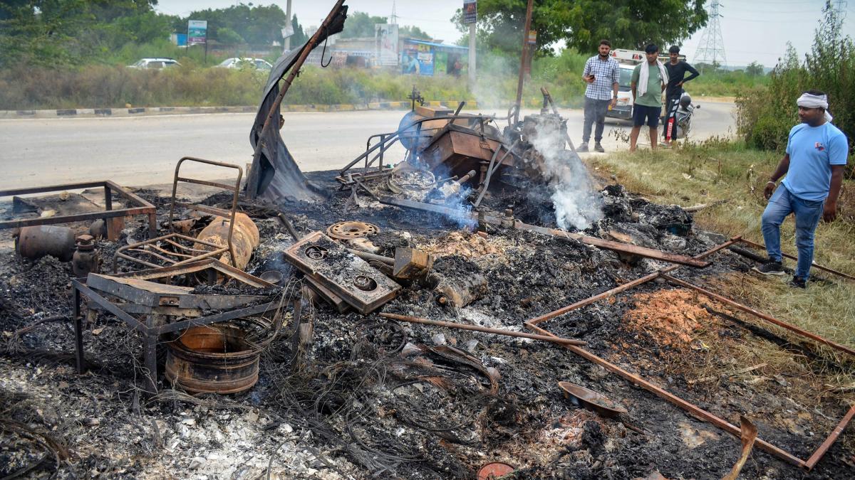 A burnt out shop in Nuh district