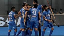 Indian men's hockey team players celebrate their win over Russia in their Tokyo Olympics qualifier