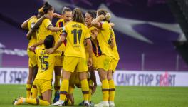 Barcelona Femeni players celebrate after beating Atletico Madrid