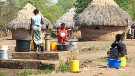 Women drawing water from the well in Zambia. Photo: Hanay, CC BY-SA 4.0 , via Wikimedia Commons