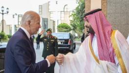 US President Joe Biden fist bumps Saudi Crown Prince Mohammed bin Salman upon arrival for a high-stakes visit, July 15, 2022