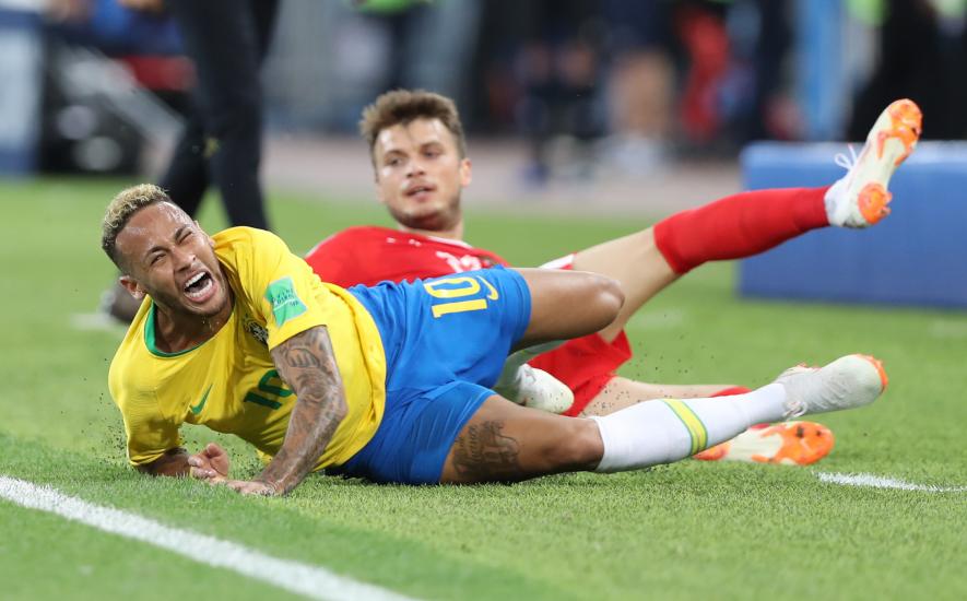 Neymar of Brazil football team gets fouled at FIFA World Cup.