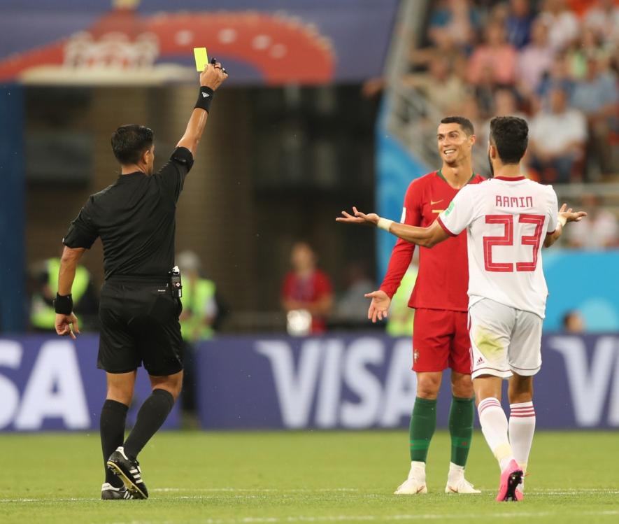 Portugal's Cristiano Ronaldo receives yellow card at FIFA World Cup