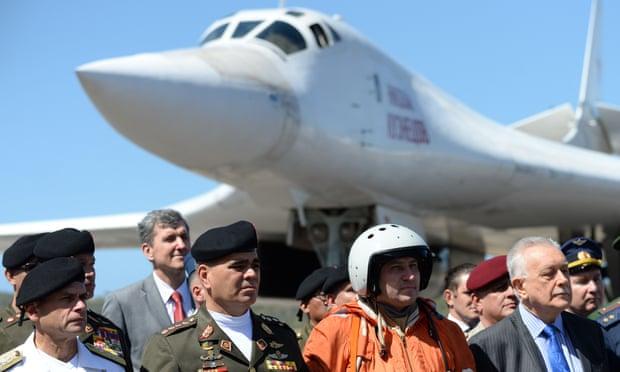 Venezuelan defence minister, Vladimir Padrino López, second left, greeting the arrival of two Russian Tupolev Tu-160 long-range nuclear-capable heavy supersonic bombers, Caracas, December 10, 2018 