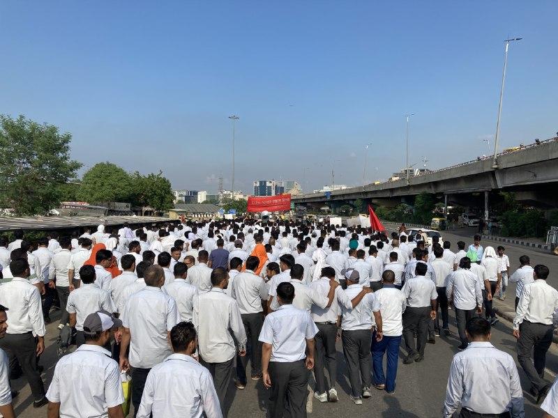 Industrial workers march in Gurugram on Monday, demanding withdrawal of false cases in the 2012 Maruti violence case. Image clicked by Ronak Chhabra