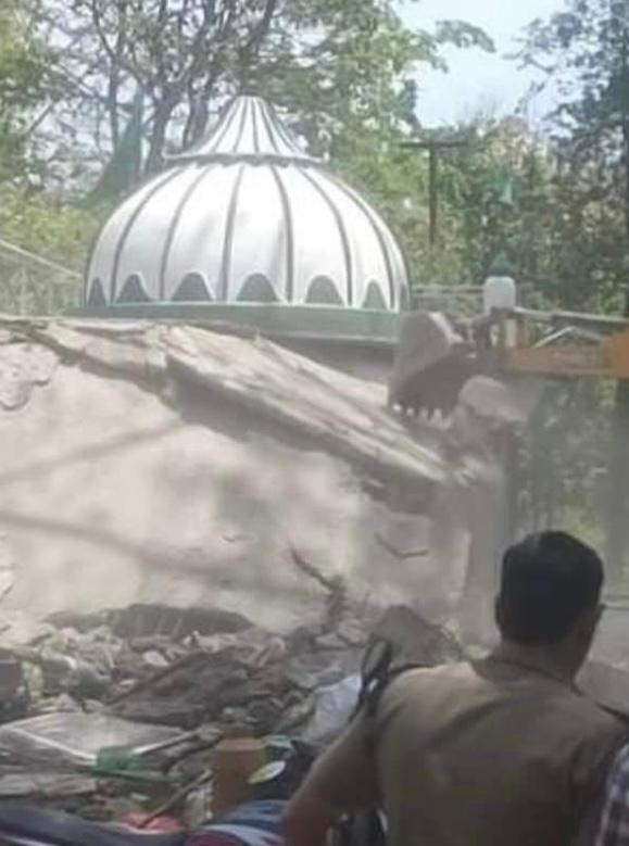 A ‘mazar’ being demolished in Uttarakhand.