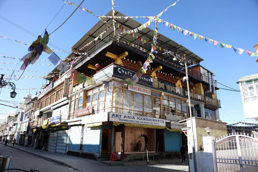 A building undergoing repairs inside the Leh Market.  